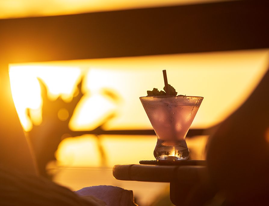 Noku Beach House - Beachfront sunset cocktails